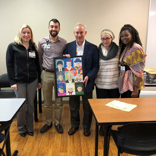 Bryan Mills with residents' collage