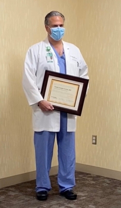 Dr. Conte receives his certificate