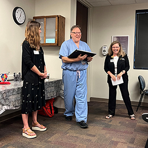 Dr. Ackerman receiving his award