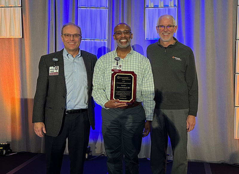 Bernard Richard, MD, receives the Community Impact Award