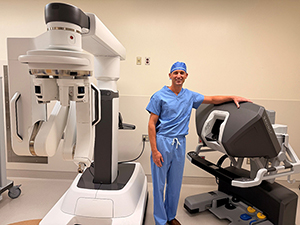 Dr. Joshua Manghelli, Community Health Network breast surgeon, with da Vinci Single Port System at Community Hospital North