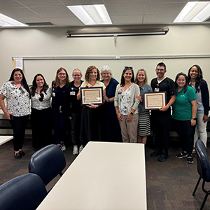 Angela Boyle and Dr. George Hoyek and team