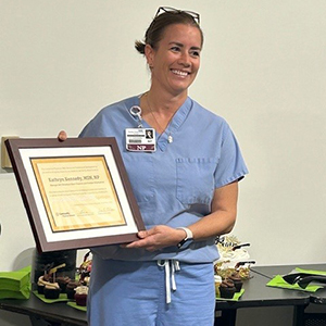 Katie Kennedy receives her award