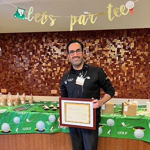 Dr. Tayebi receives his award