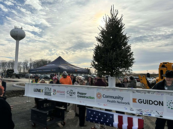 Employees signing Community Hospital Westfield final steel beam
