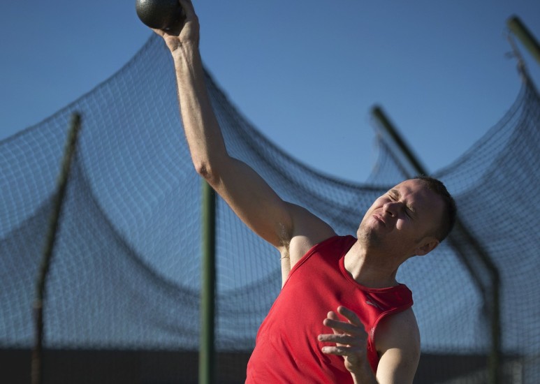 Athlete throwing shotput