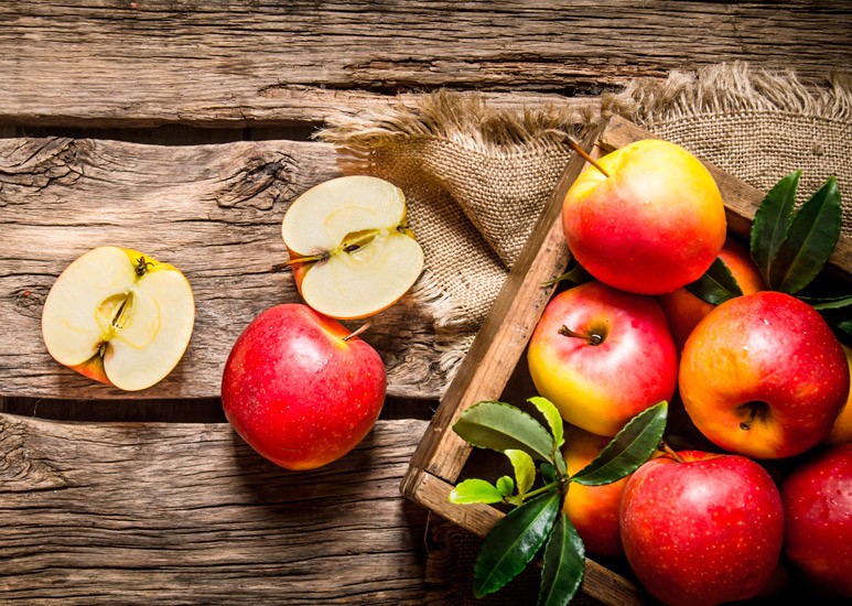 Fall apples on a wooden table
