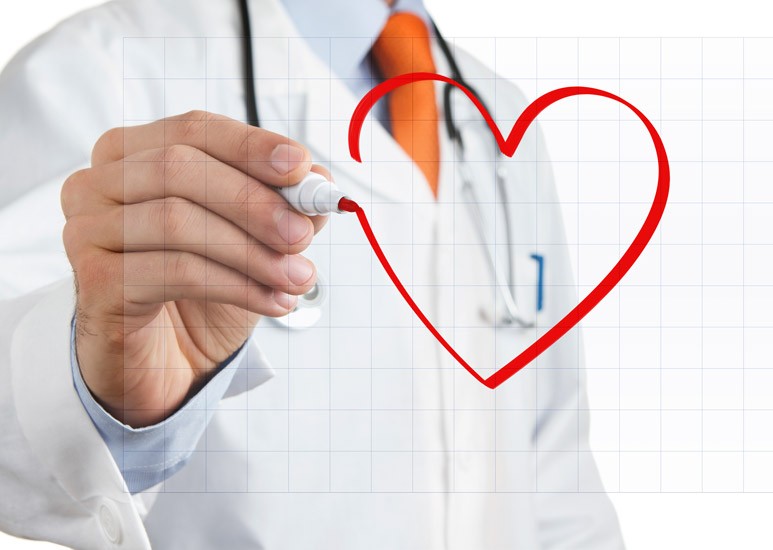 Doctor drawing heart