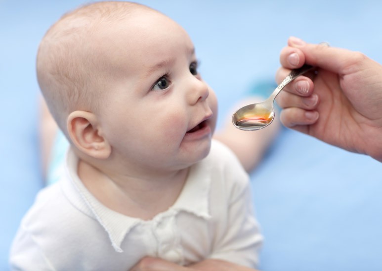 Baby taking medicine