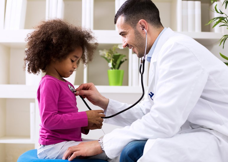 Child with pediatrician