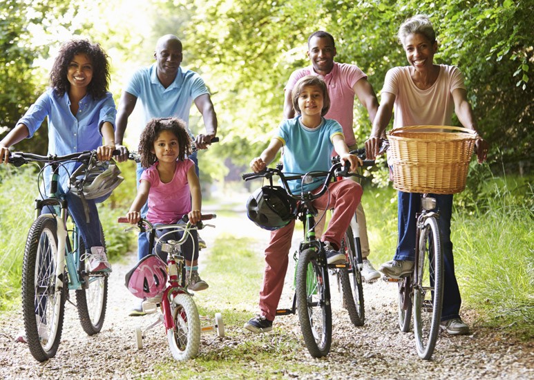 Family biking on a trail
