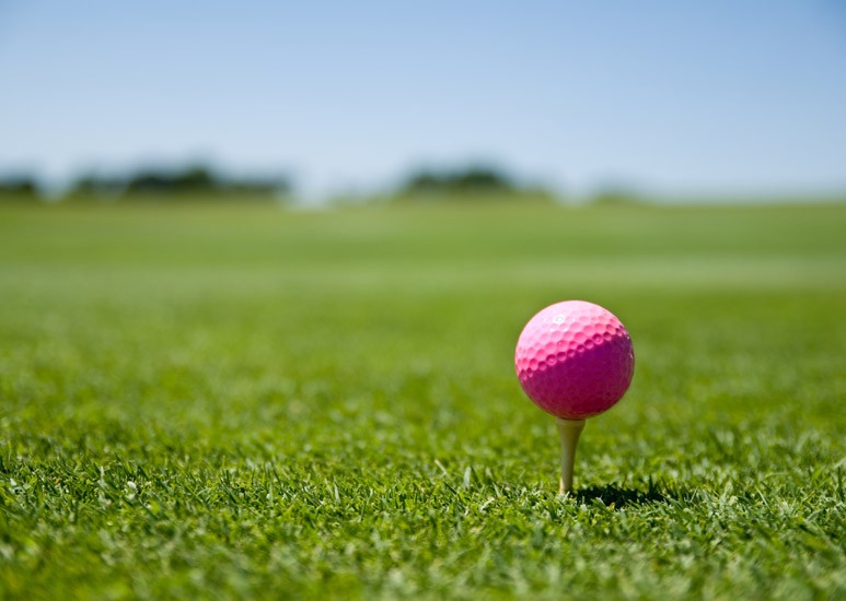 Pink golf ball for a cure