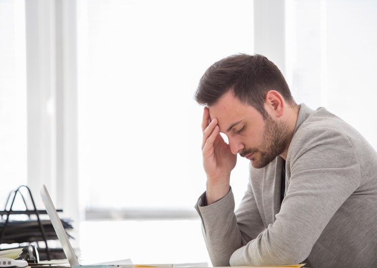 Working man with headache