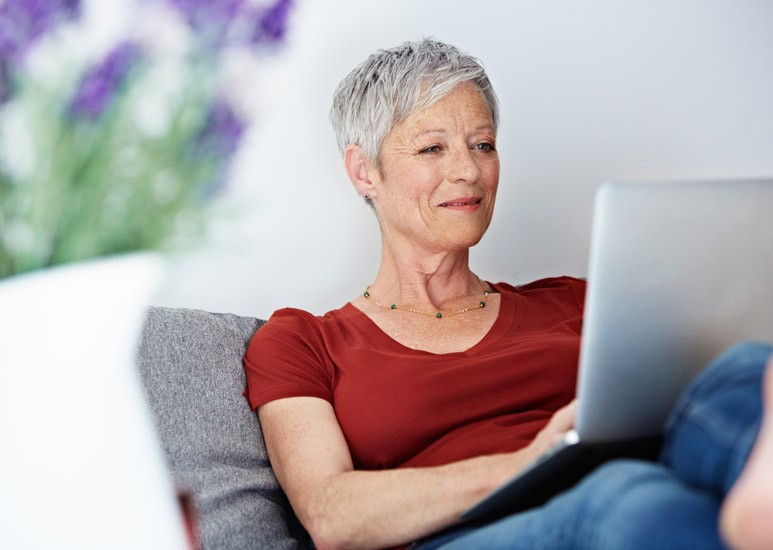Senior woman using laptop