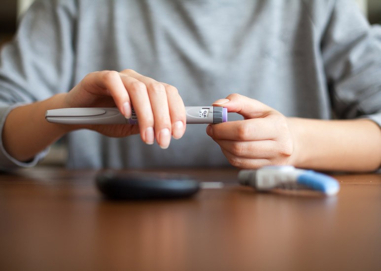 Person checking glucose level