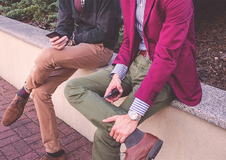 Young men sitting and talking