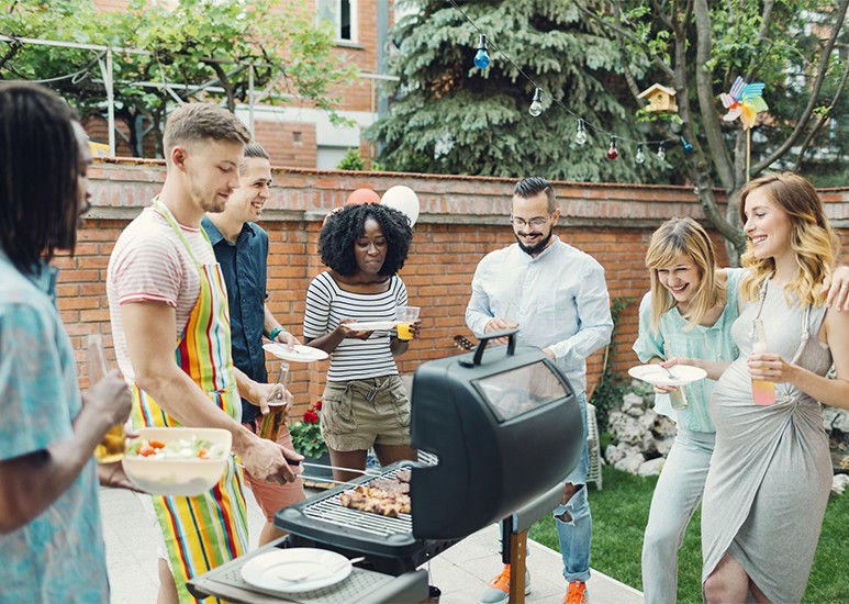 Friends grilling at a cookout