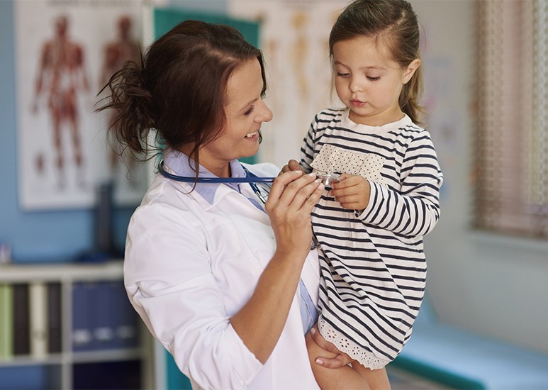 Doctor reassures a child