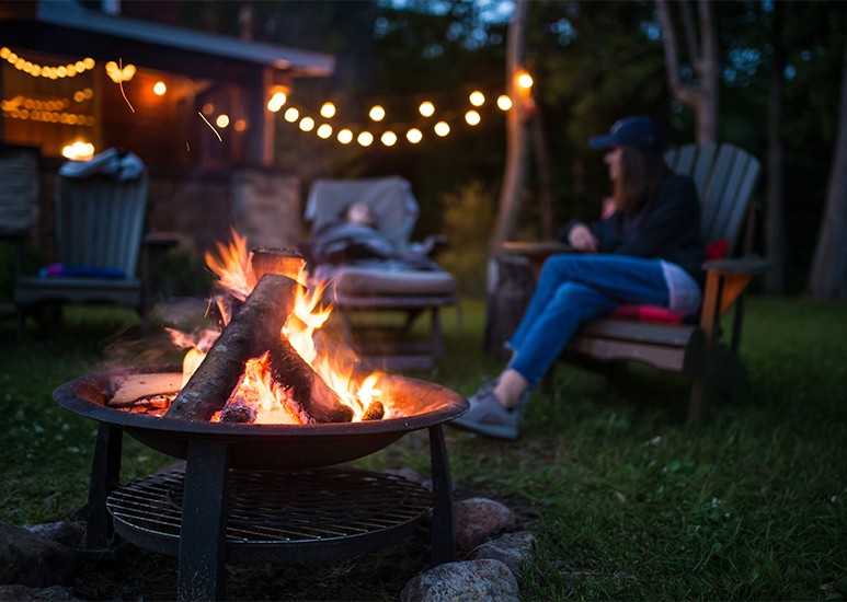 Family around bonfire