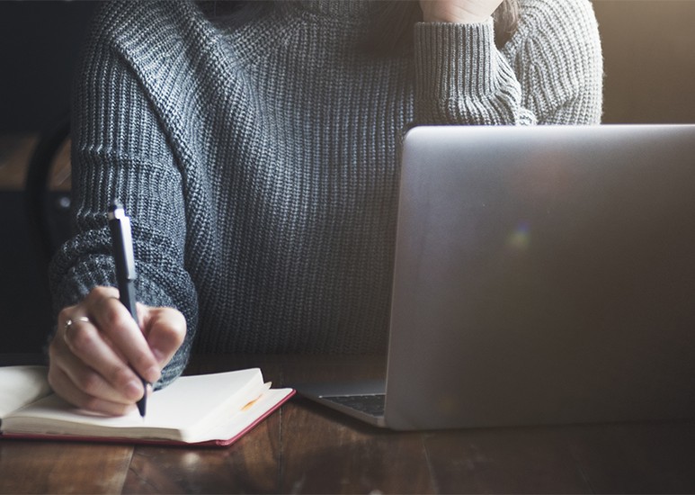 Woman working at a computer