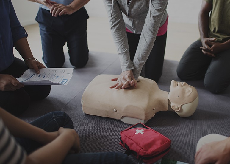 people learning how to give hands-only CPR