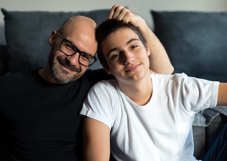 Dad talking with son