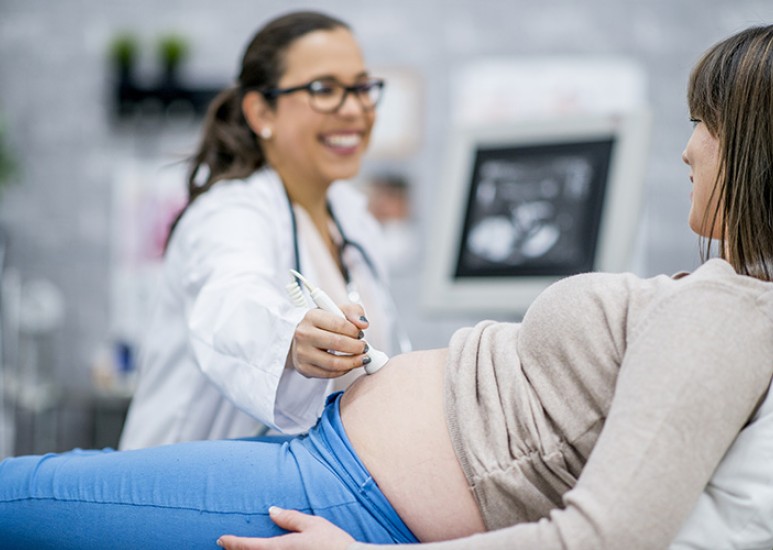 pregnant woman with caregiver