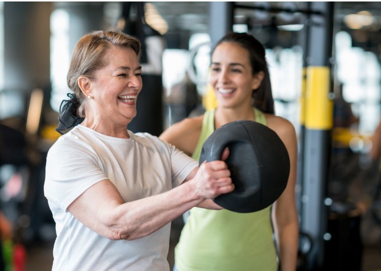 adult women working out at gym
