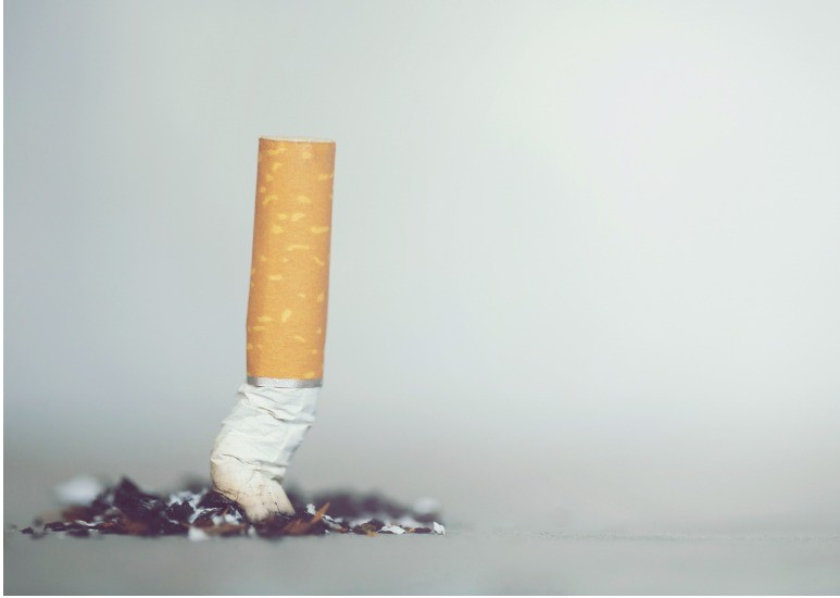 Cigarette Butt Put Out on Floor