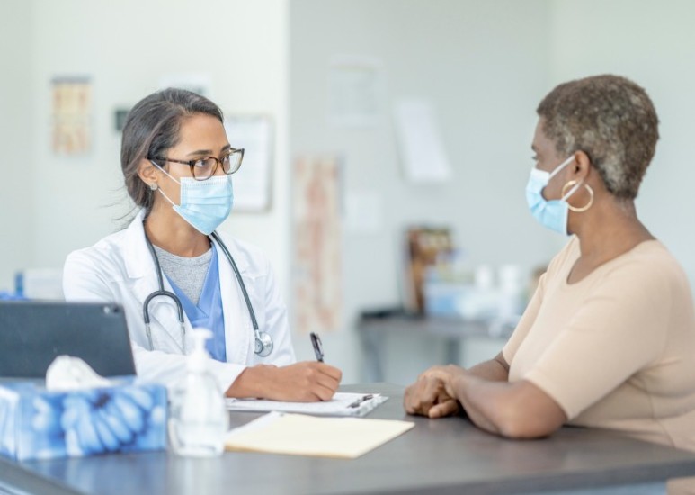 doctor and patient discussing care 