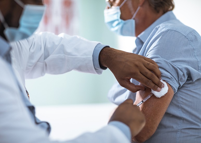 Man receiving vaccine