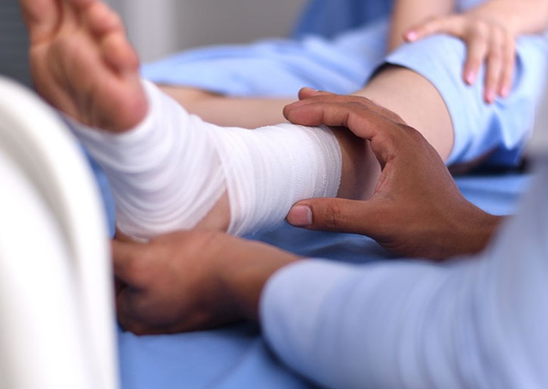 advanced foot wound being treated 