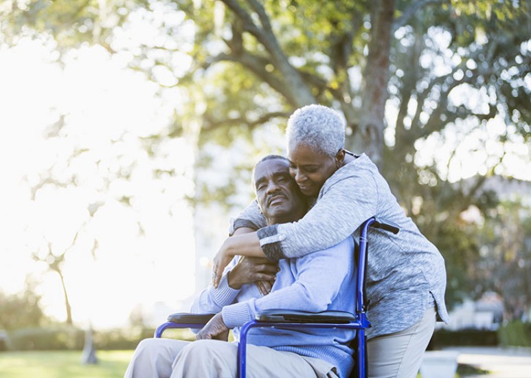 couple outside hugging 