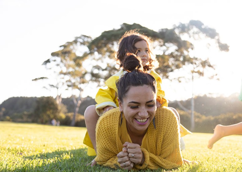 women enjoying sun with family
