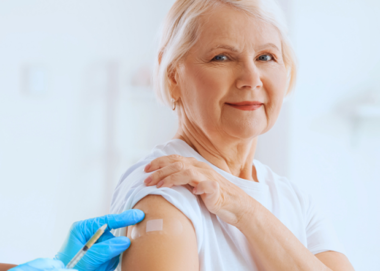 Older woman getting a vaccination 