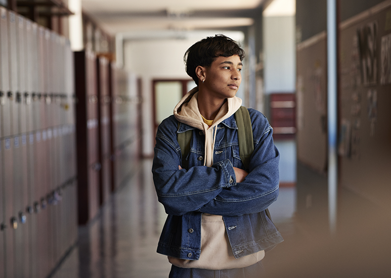 Teen in School Hallway
