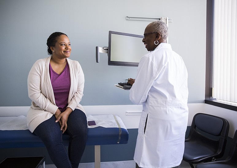 patient at annual physical appointment with primary care provider