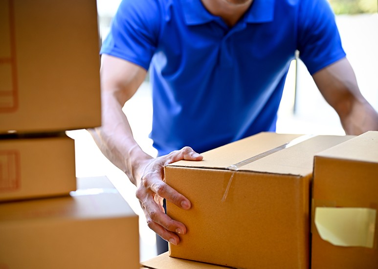 Man delivering heavy packages
