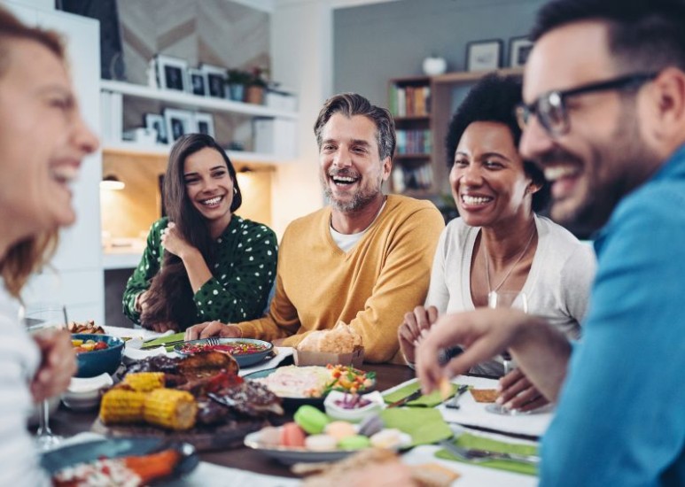 Friends talking over a meal
