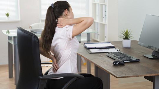 Office worker with back pain