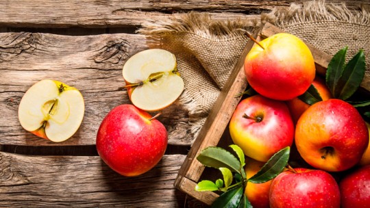 Fall apples on a wooden table