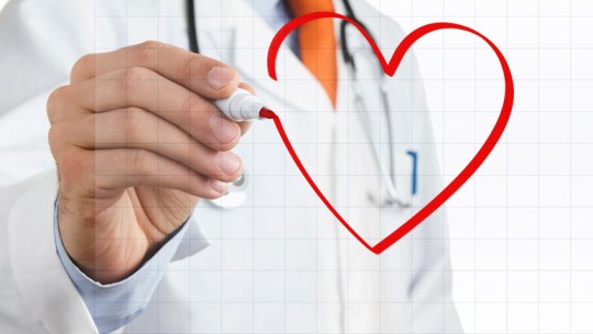 Doctor drawing heart