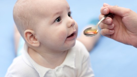 Baby taking medicine