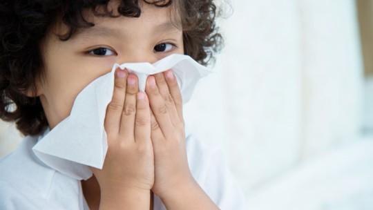 Child with a nosebleed