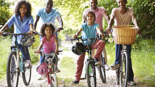 Family biking on a trail