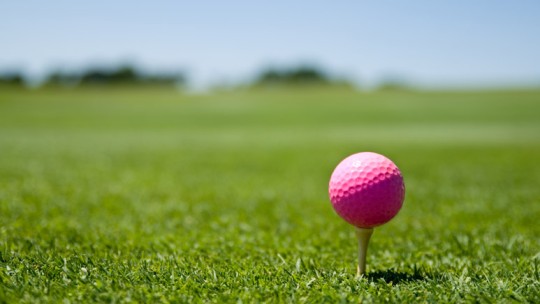 Pink golf ball for a cure