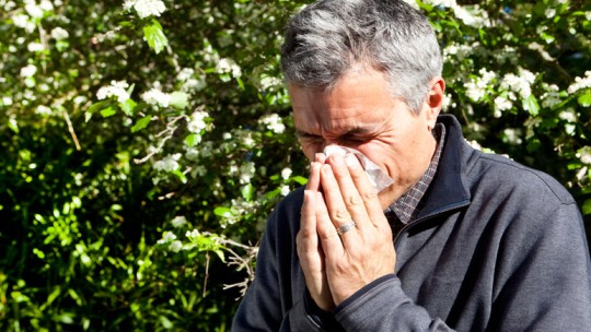 Man with springtime allergies