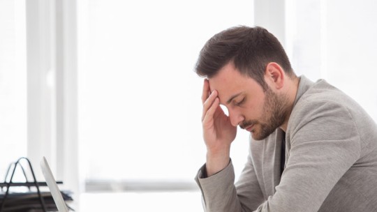 Working man with headache