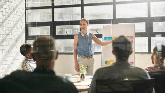 Woman giving work presentation