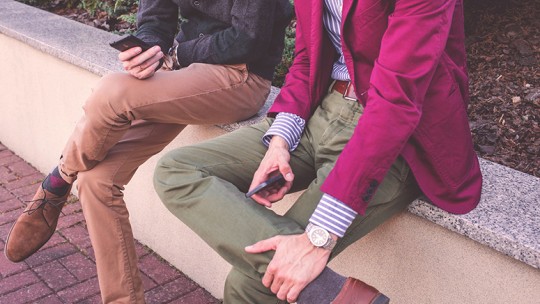 Young men sitting and talking